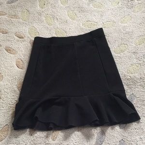 Black bodycon skirt with flounce